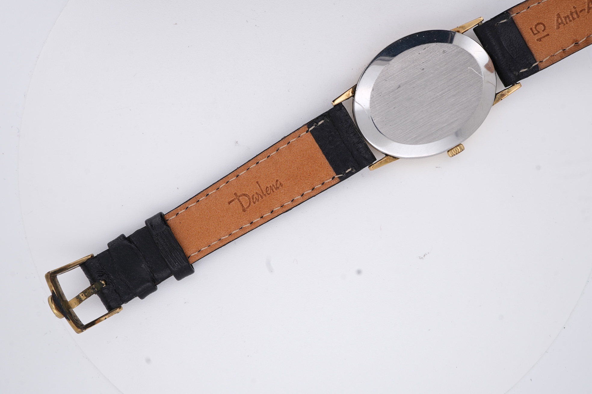 A lady's early 1970's steel and gold plated Omega manual wind wrist watch, with oval dial and baton numerals, case diameter 26mm, movement c.620, on an associated leather strap, with box no papers.